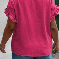 Mandotos Curvy Samantha Blouse featuring a stylish design with a flattering fit and elegant details.