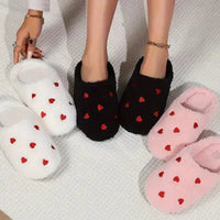 Mandotos Cushy Heart Top Fluffy Slippers with soft, plush material and heart-shaped design for cozy comfort.