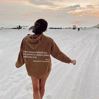 Mandotos women's plush hoodie with printed message, kangaroo pocket, drawstring hood, and trendy unisex design.