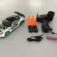 Mandotos 4WD 2.4G RC Drift Car GTR model AE86 remote control racing toy for children, suitable for Christmas gifts.