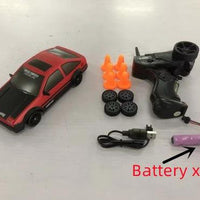 Mandotos 2.4G 4WD RC Drift Car toy with GTR model and AE86 design, remote control racing car for children and Christmas gifts.