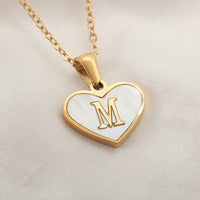 Mandotos 26-letter heart-shaped necklace with white shell accents, personalized love charm, stylish clavicle chain for women jewelry.