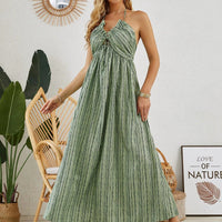Mandotos bohemian halter maxi dress for women, sleeveless and flowy, perfect for summer beach wear, with boho-style design.