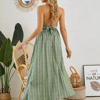 Mandotos women's bohemian halter maxi dress with sleeveless, flowy fabric, perfect for summer beachwear.