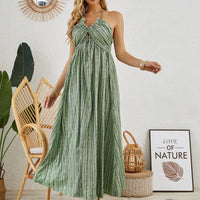 Mandotos bohemian halter maxi dress for women, sleeveless and flowy, ideal for summer beachwear and casual outdoor wear.