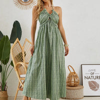 Mandotos bohemian halter maxi dress for women, sleeveless and flowy beach dress perfect for summer, with vibrant floral patterns.