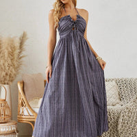 Mandotos bohemian halter maxi dress for women, sleeveless flowy beach dress with a relaxed summer style and vibrant pattern.