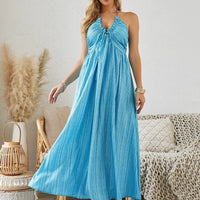 Mandotos bohemian halter maxi dress for women, sleeveless and flowy, ideal for summer beachwear and casual outdoor occasions.