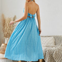 Mandotos women's bohemian halter maxi dress, sleeveless and flowy, ideal for summer beachwear, with a relaxed, breezy style.