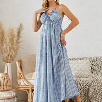 Mandotos women's bohemian halter maxi dress, sleeveless and flowy, perfect for summer beachwear, with a relaxed, breezy style.