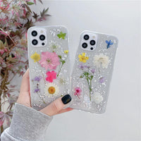 Silver foil dried flowers by Elysian Designs for epoxy phone cases, featuring elegant, unique decor with silver accents and floral details.