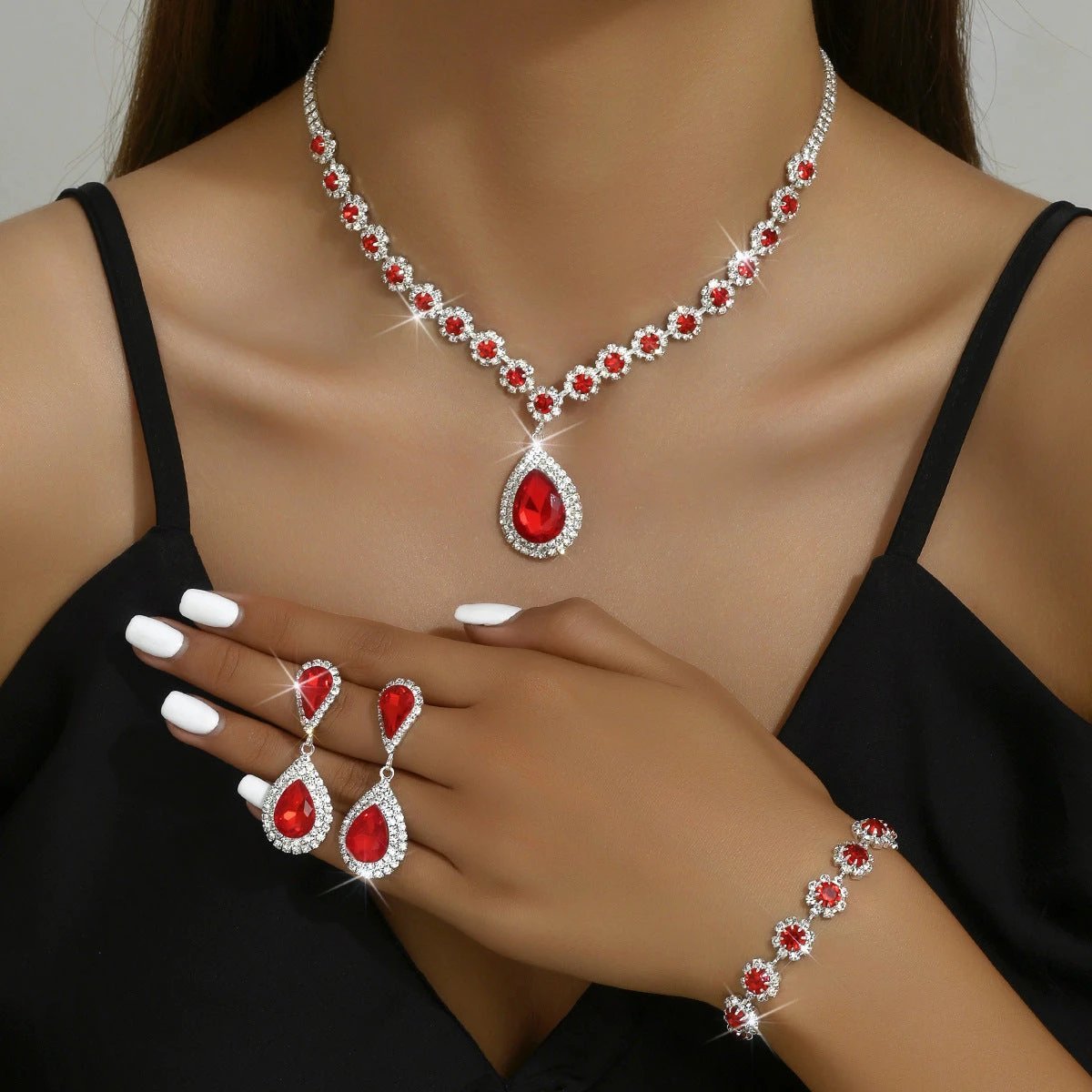 Mandotos bridal jewelry set including necklace, ear studs, and bracelet with elegant designs for wedding or special occasions.