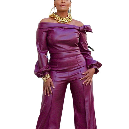 Mandotos Glamourista women's trendy leather suit in stylish black, featuring a fitted blazer and matching pants for a chic look.