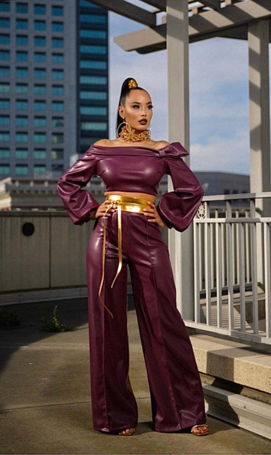 Mandotos Glamourista women's trendy leather suit, stylish and confident, shown in a chic, modern fashion pose.
