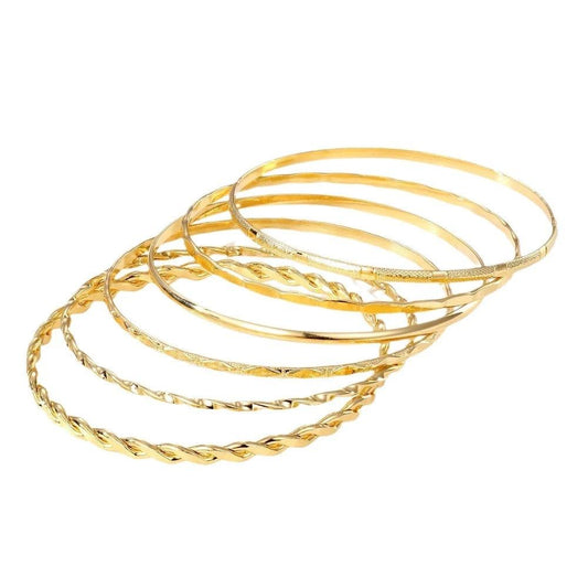 Six-piece MANDOTOS bohemian metal chain bracelet set for women with geometric gold-colored thick link bangles on a white background.