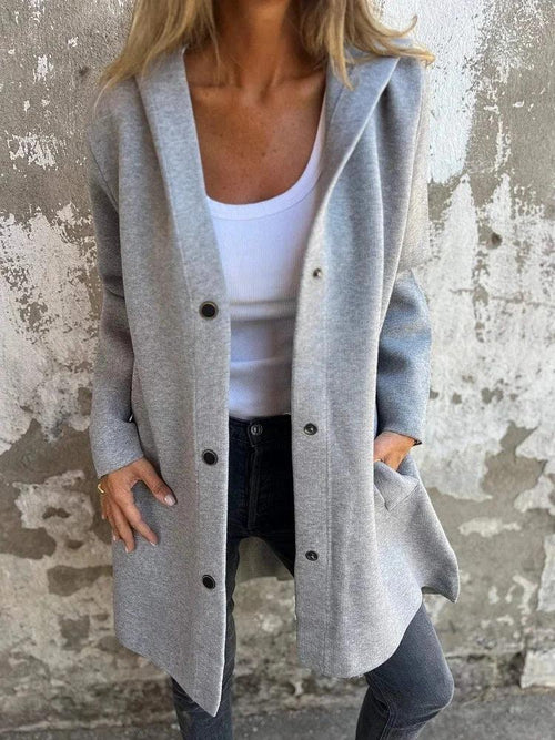 Red hooded cardigan by MANDOTOS, single-breasted loose-fit jacket with front pockets and casual style.