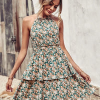 Mandotos summer printed halter dress for women, boho backless ruffled A-line beach dress, perfect for warm-weather outings.