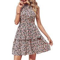 Mandotos summer printed halter dress with boho style, backless design, ruffled A-line silhouette, perfect for beach and casual wear
