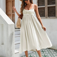 Women's Bohemian maxi dress by MANDOTOS featuring breathable rayon fabric, embroidered bust, elastic back, and flowy skirt in black, white, and green.