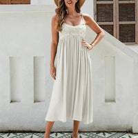 Women's Bohemian Maxi Dress by MANDOTOS with breathable rayon fabric, embroidered bust, elastic back, and flowy skirt in black, white, and green.