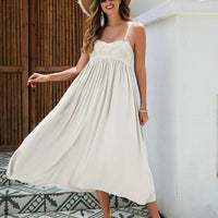 Women's Bohemian Maxi Dress by MANDOTOS featuring breathable rayon fabric, embroidered bust, elastic back, and flowy skirt in black, white, and green.