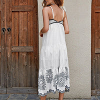 Women's cotton embroidered midi dress by Mandotos featuring black and white A-line sundress with contrast trim, ideal for vacation.