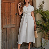 Women's cotton shirt dress by MANDOTOS featuring breathable fabric, X-line midi style, and a knotted waist for a flattering fit.