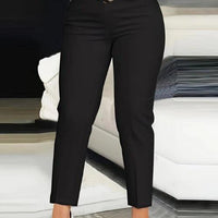 Women's fashionable clothing by MANDOTOS, featuring a stylish outfit displayed on a model in a casual indoor setting.
