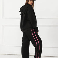 Women's long-sleeved hoodie set by MANDOTOS, featuring a comfortable top and matching pants in a casual, cozy style.