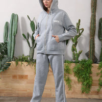 Women's long-sleeved hoodie set by MANDOTOS, featuring a comfortable matching top and pants in a casual, relaxed fit.