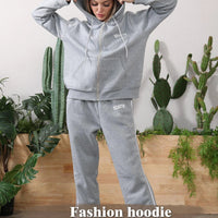 Women's long-sleeved hoodie set by MANDOTOS, featuring a comfortable matching top and pants in soft fabric.