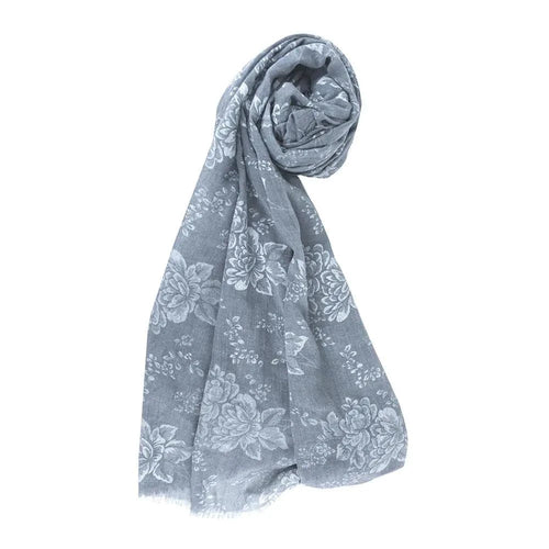 Mandotos denim blossom poncho featuring floral embroidery and relaxed fit, perfect for casual stylish wear.