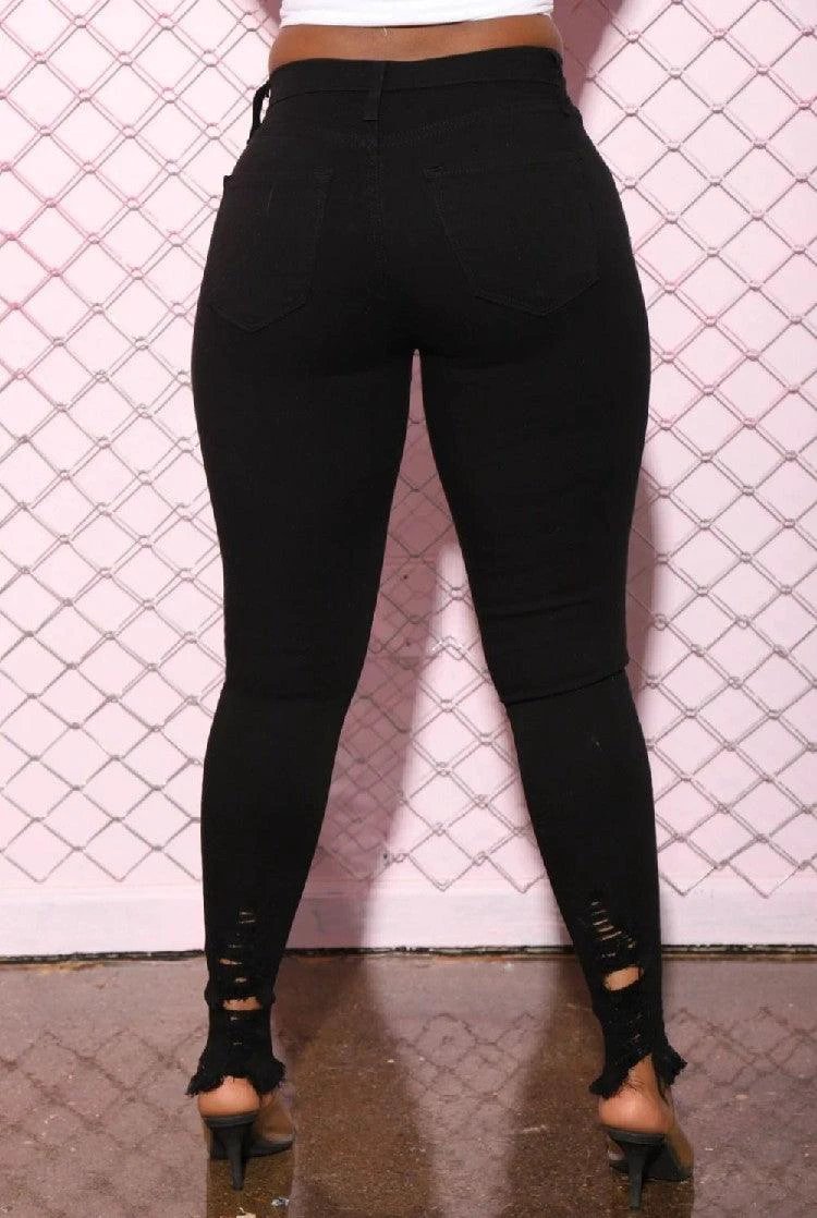 Mandotos denim pencil pants for women with slim fit, ripped holes, stretch fabric, long length, and tapered feet.