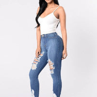 Mandotos denim pencil pants for women, slim fit long trousers with ripped holes and stretch fabric, stylish casual denim pants.