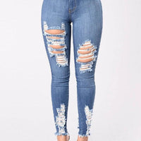 Mandotos denim pencil pants for women, slim fit, long style with ripped holes and stretch feet design.