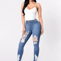 Mandotos denim pencil pants for women featuring slim fit, ripped holes, stretch fabric, and long tapered legs.