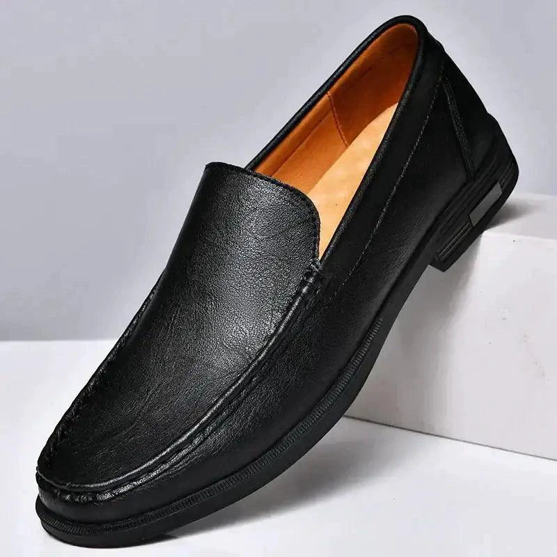 Mandotos Eco-Chic Leather Loafers featuring sleek design, smooth leather finish, and classic slip-on style for casual or formal wear.