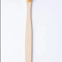Mandotos EcoPure bamboo toothbrush with natural bamboo handle and soft bristles, eco-friendly dental care product.
