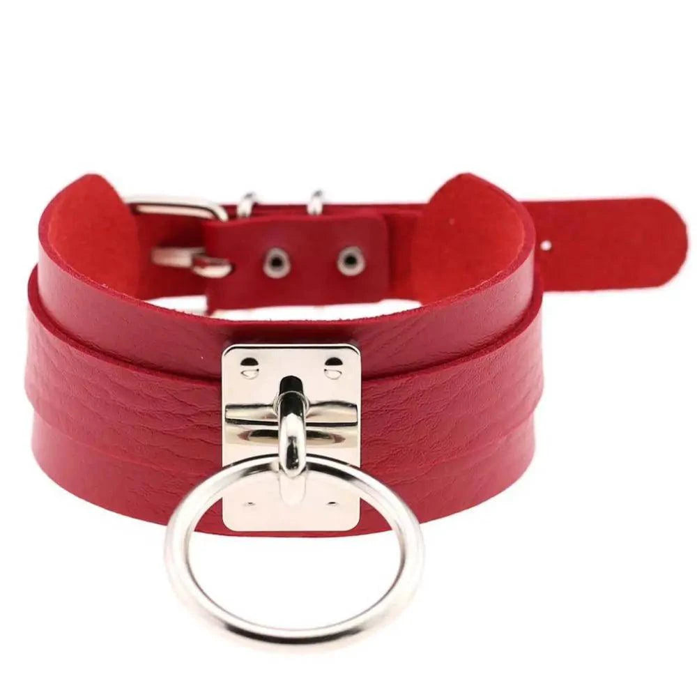 Black edgy leather choker collar with silver buckle and studs, designed by MANDOTOS for a bold fashion statement.