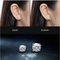 Elegant 18K gold and silver moissanite stud earrings with sparkling gemstones, showcasing a sophisticated jewelry design.