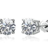Elegant 18K gold moissanite silver stud earrings featuring sparkling gemstones and a sleek, stylish design.