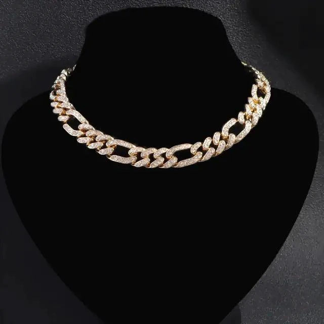 Elegant cubic zirconia Cuban necklace by MANDOTOS featuring sparkling stones and a bold chain design.