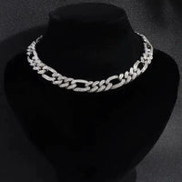 Elegant cubic zirconia Cuban necklace by MANDOTOS featuring a bold, stylish chain with sparkling stones.