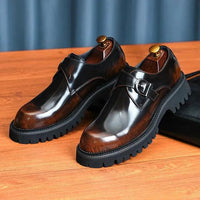 Elegant genuine leather shoes by MANDOTOS featuring a sleek design and polished finish, perfect for formal or casual wear.
