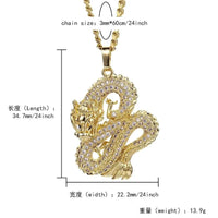 Elegant gold zircon dragon pendant by MANDOTOS featuring intricate design and sparkling gemstone accents.