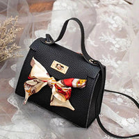 Elegant leather handbag paired with a matching scarf from MANDOTOS, displayed with the accessories on a neutral background.