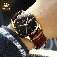 Elegant leather timepiece by MANDOTOS featuring a classic watch face and brown leather strap.