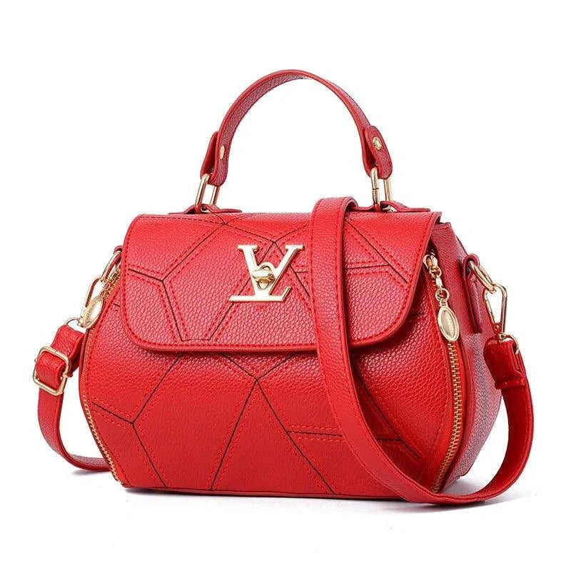Elegant leather tote bag by MANDOTOS with structured design, top handles, and sleek finish, perfect for stylish everyday use.