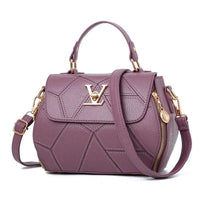 Elegant leather tote bag by MANDOTOS with sturdy handles and sleek design, perfect for everyday use.