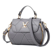 Elegant leather tote bag by MANDOTOS featuring sleek design, sturdy handles, and spacious interior for everyday use.